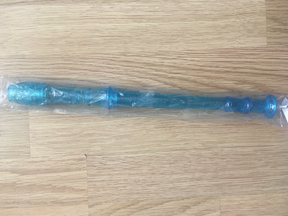 Niebieski plastikowy flet zabawka